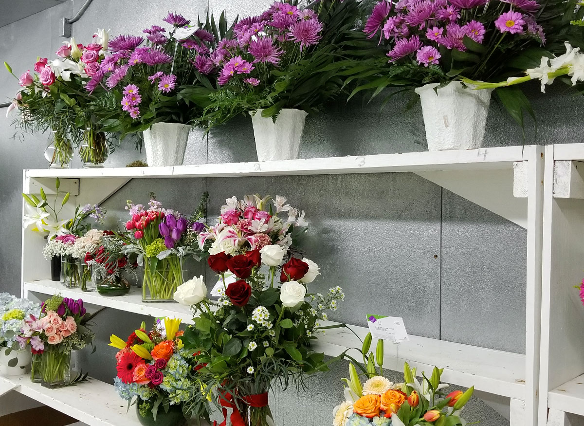 Potted arrangements and bouquets on display in our Houston location